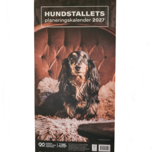 En kalender med en bild på en hund.
